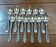 Set of 12 small silver-plated spoons in their box.