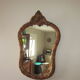 Old mirror in wood and stucco dorè