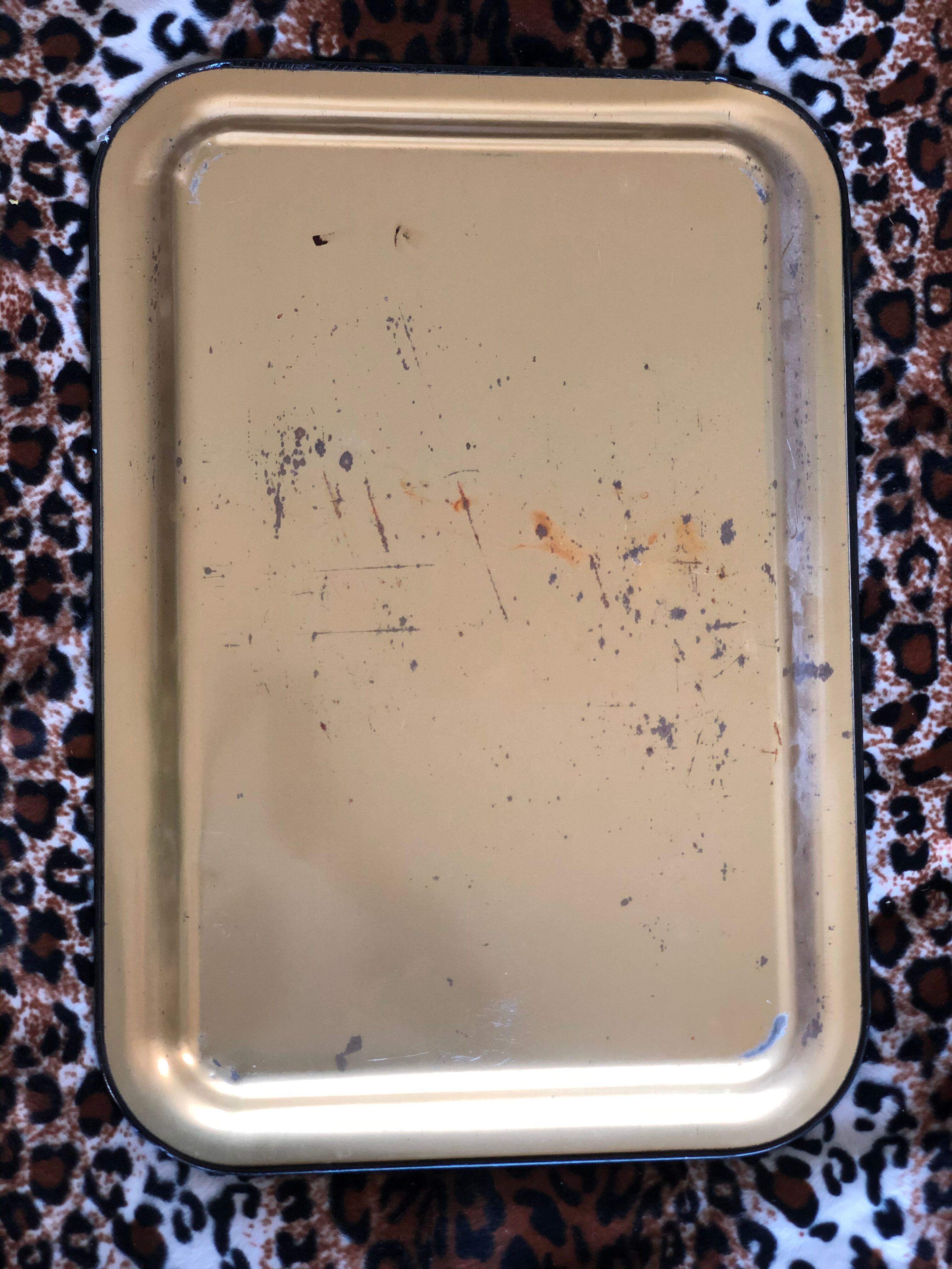 Black tray with floral motifs