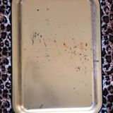 Black tray with floral motifs