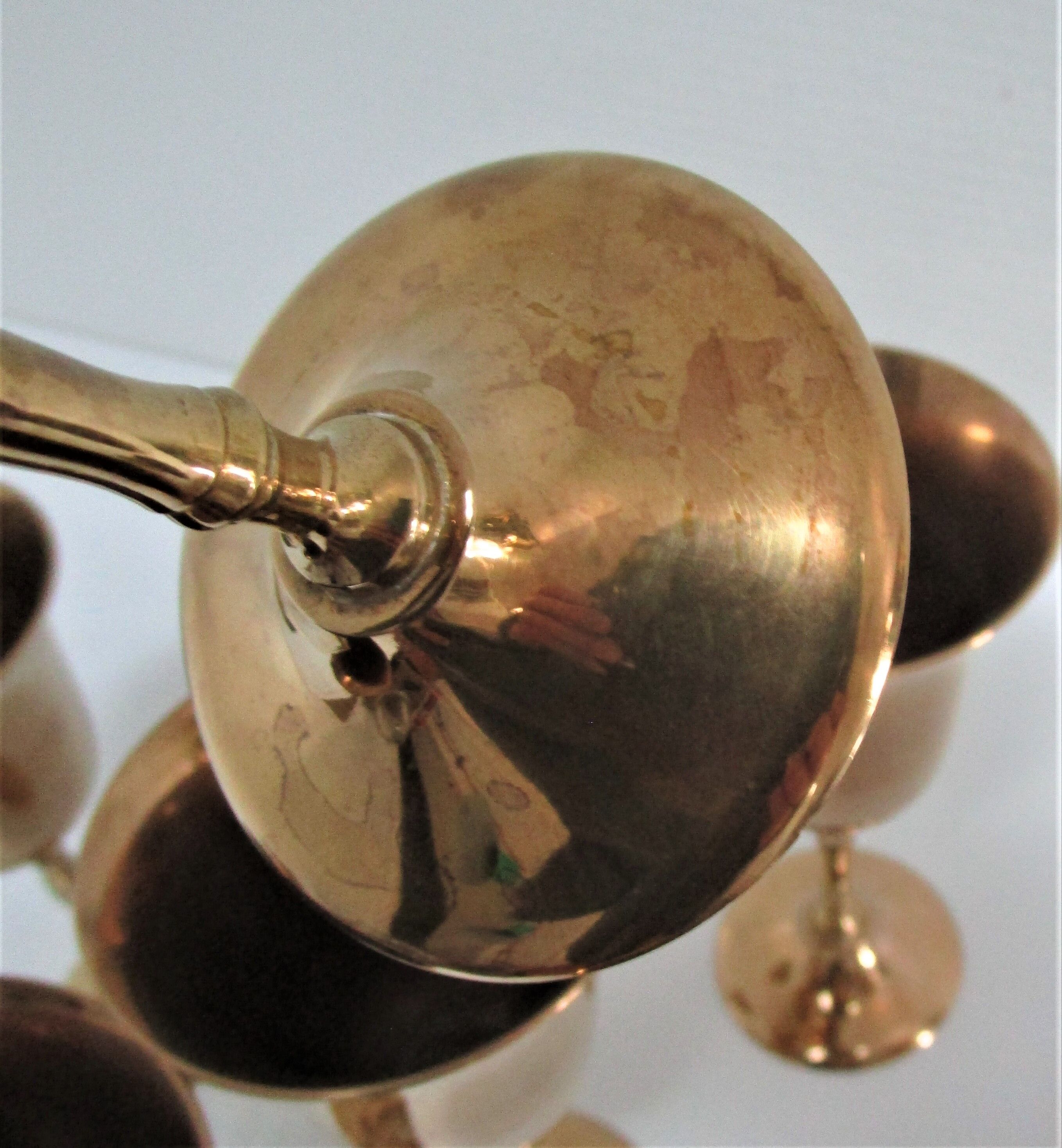 Set of eight vintage solid brass walking glasses