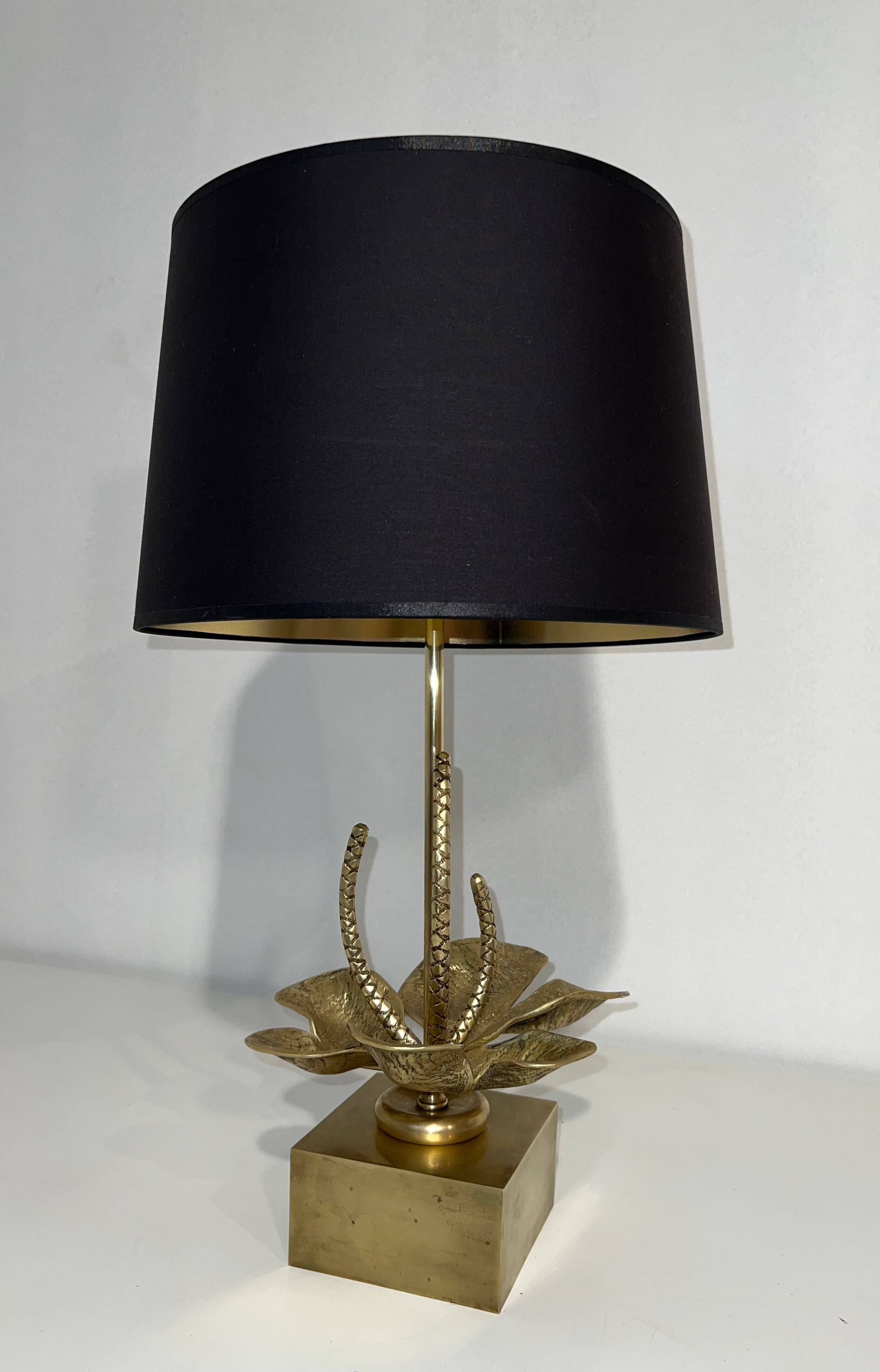 Bronze and brass lily pad lamp attributed to Maison Charles. Circa 1970.