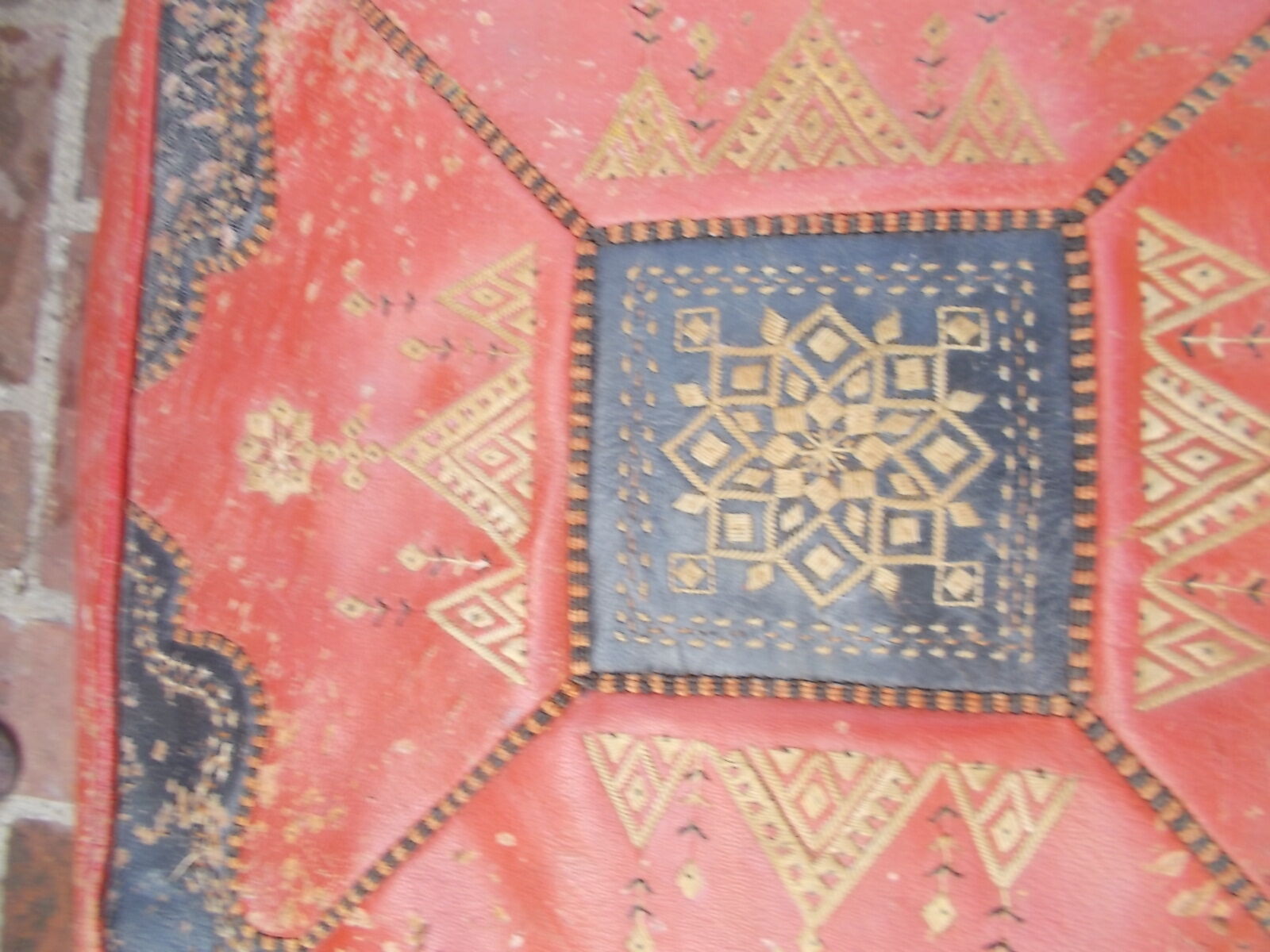 Red and black moroccan pouf