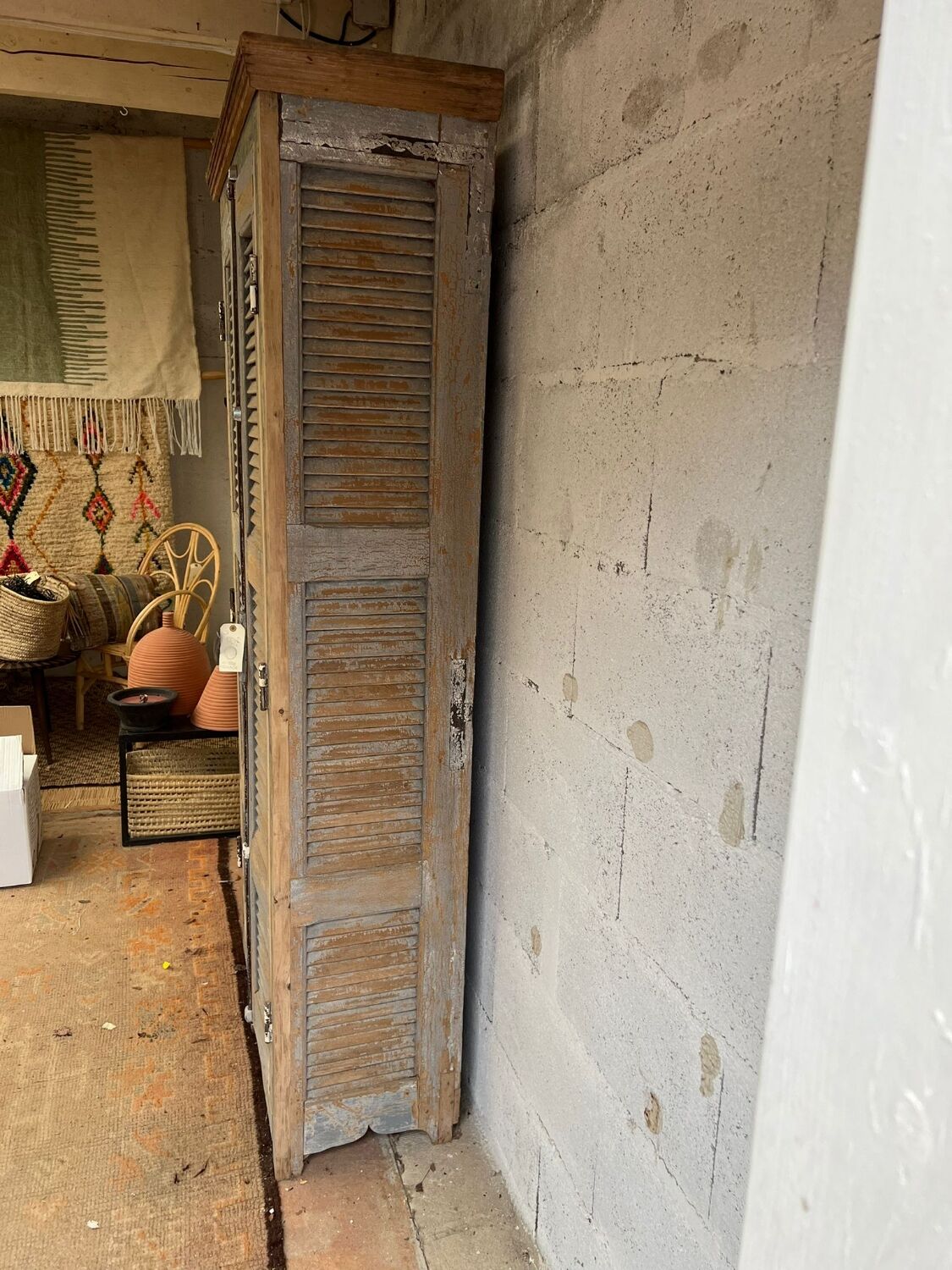 Wooden shuttered wardrobe