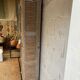 Wooden louvered wardrobe