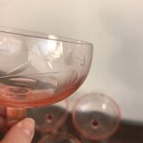 Champagne glass in pink glass with floral engraving