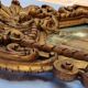 Antique wall mirror in carved gilded wood, Louis XV style, 19th century, 98 x 57 cm.