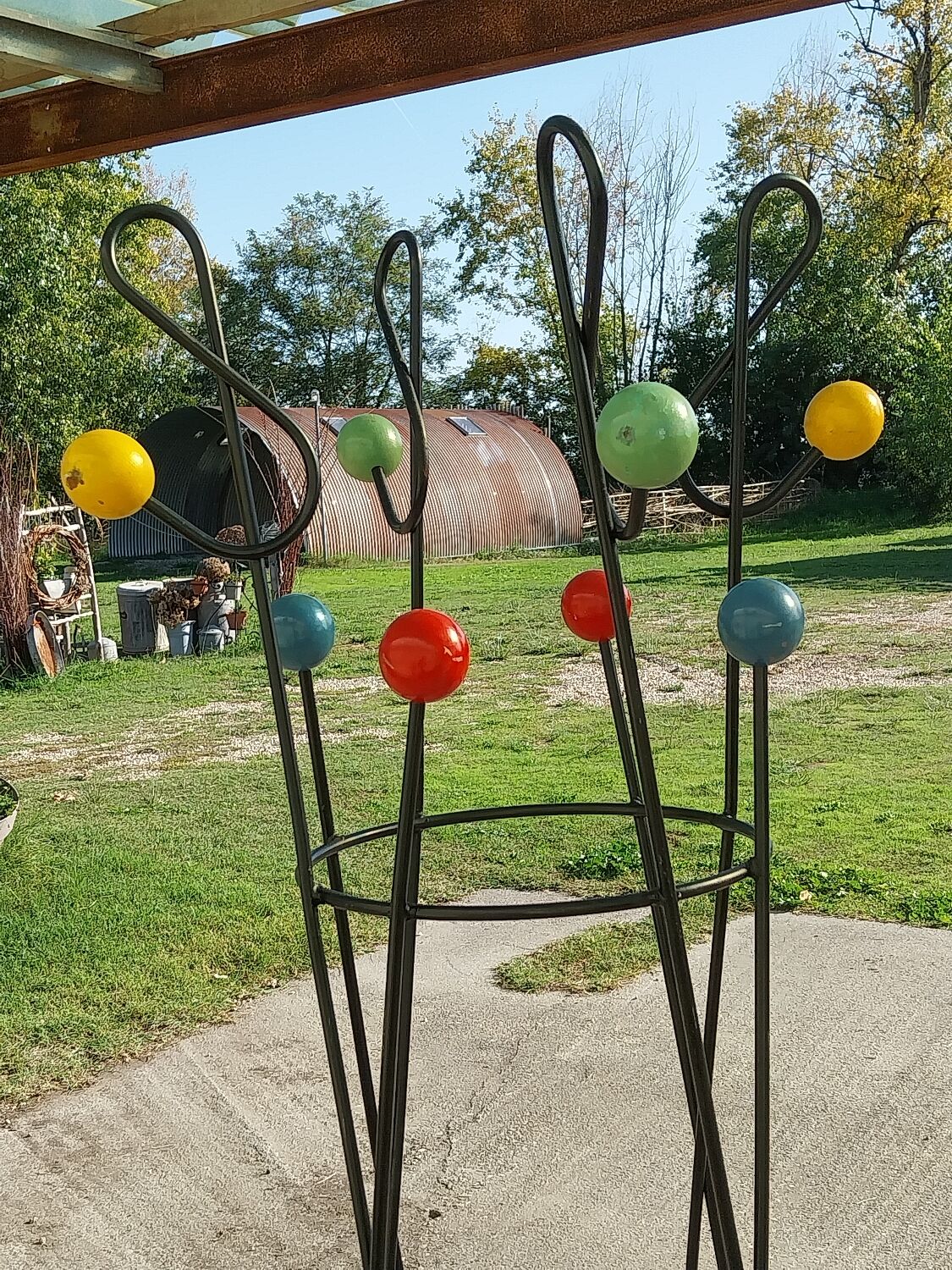 Coat rack attributed to Roger Feraud “treble clef” model