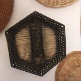 Wall composition of 9 wicker baskets and trays.