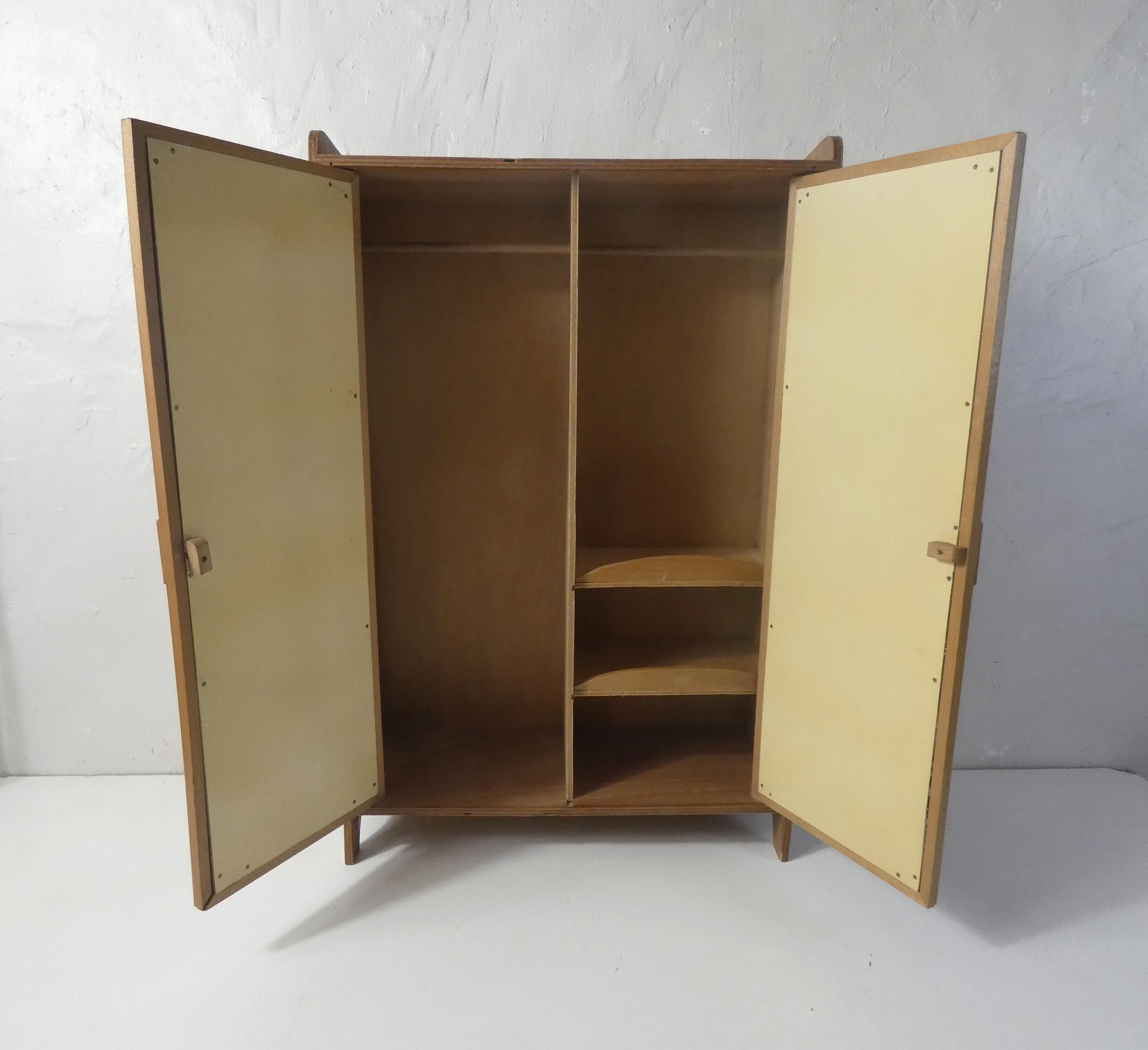 Rattan doll cabinet
