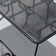 Ensemble de 6 fauteuils et table en métal perforé 1950