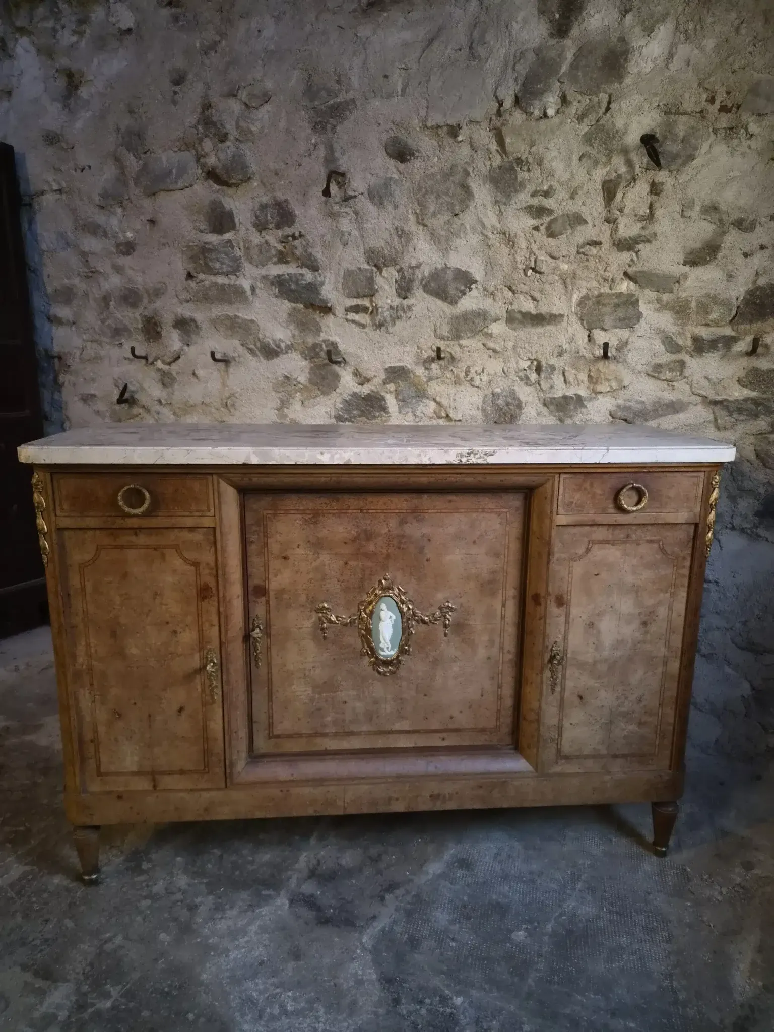 Antique Louis XVI style buffet in burr elm with marble top, late 19th century.