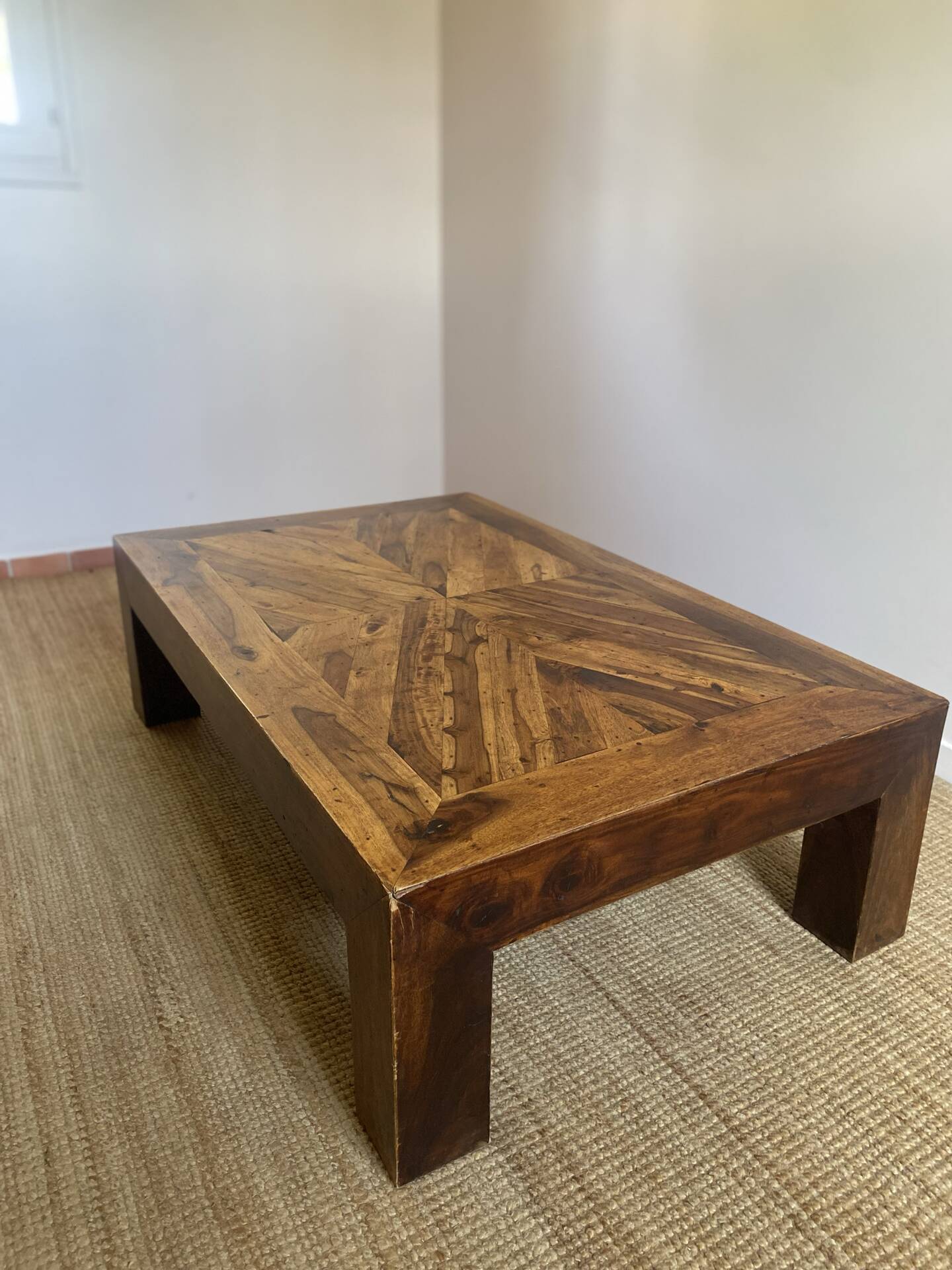 Solid wood coffee table with marquetry top