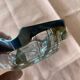 Glass and silver ashtray