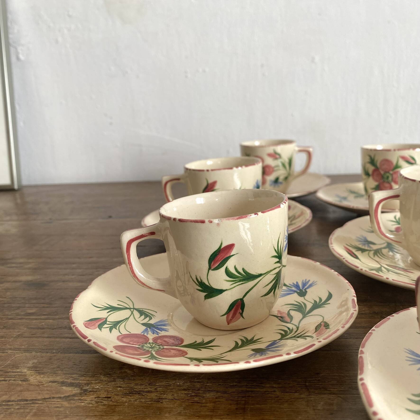 Coffee cups and saucers in Desvres earthenware.
