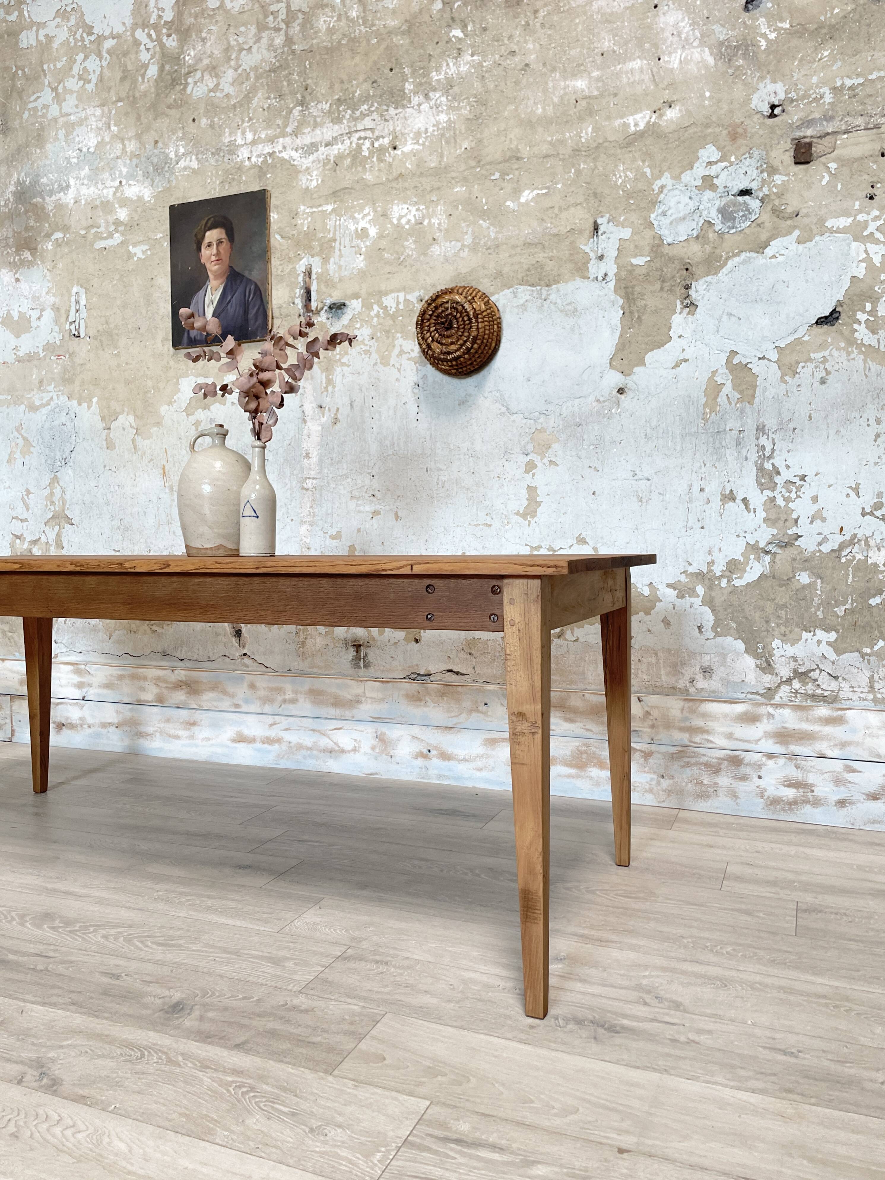 Vintage farm table with spindle legs.