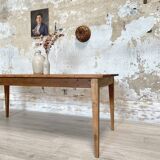 Vintage farm table with spindle legs.