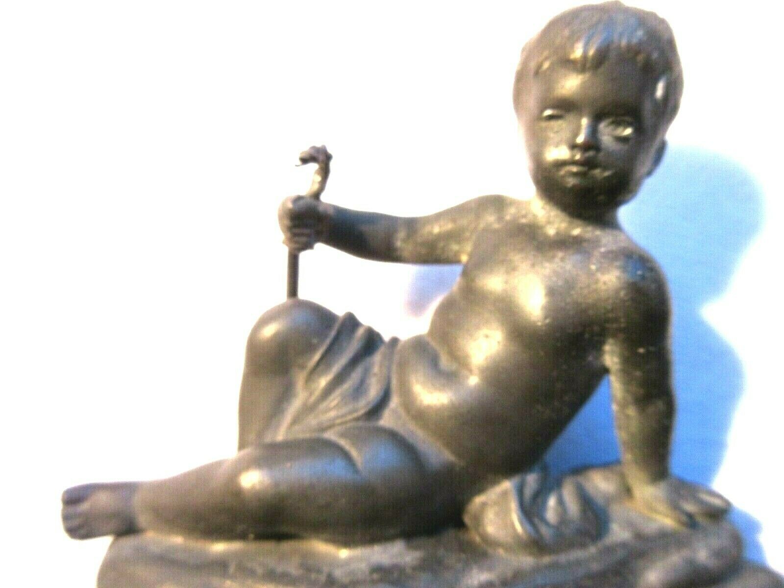 Double ink out 19th in tin signed J. GARNIER: The Cherub fisherman