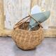Panier boule en rotin tressé à anse