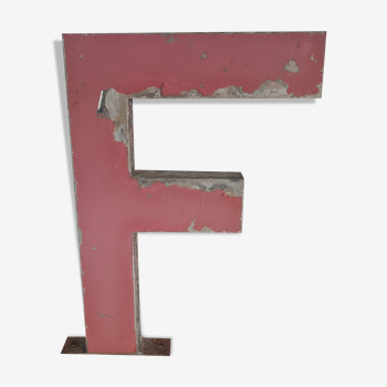 Letter F in vintage iron