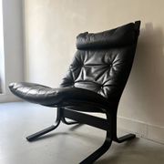Scandinavian black leather armchair Siesta by Ingmar Relling, design 1970.