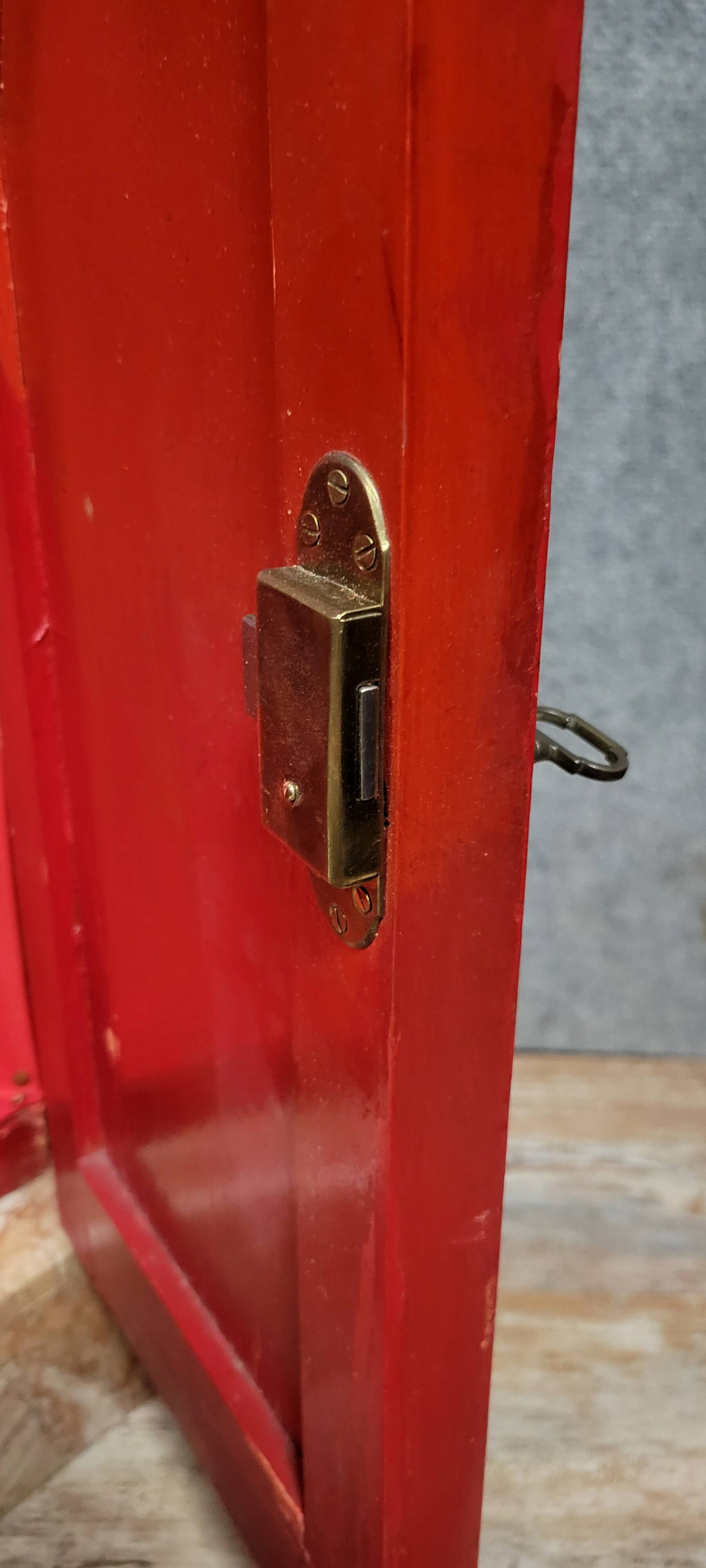 Important Art Deco period bookcase in lacquered wood and gilded bronze