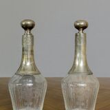 Pair of antique crystal and solid silver decanters.
