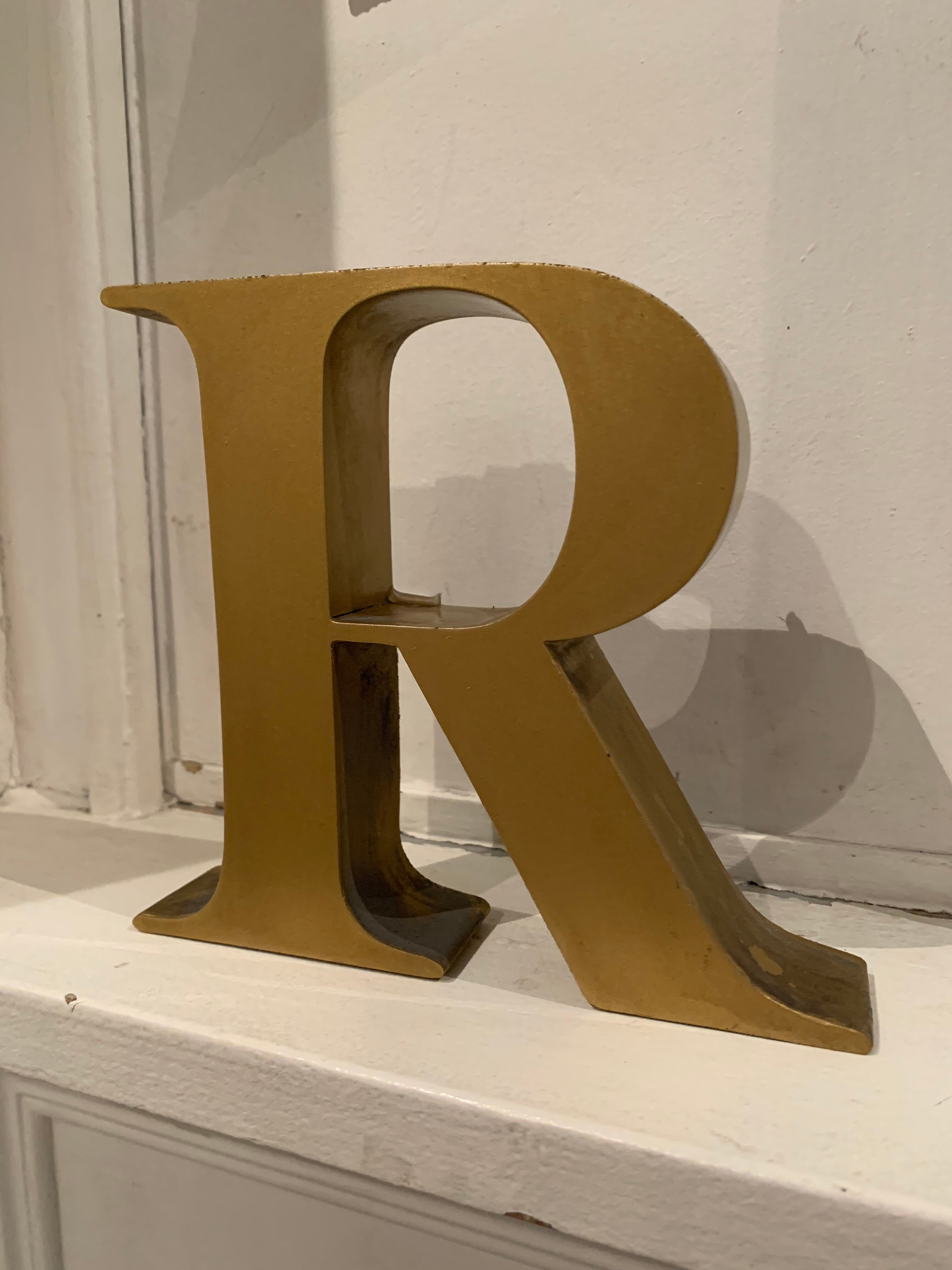 Letter.E . vintage metal