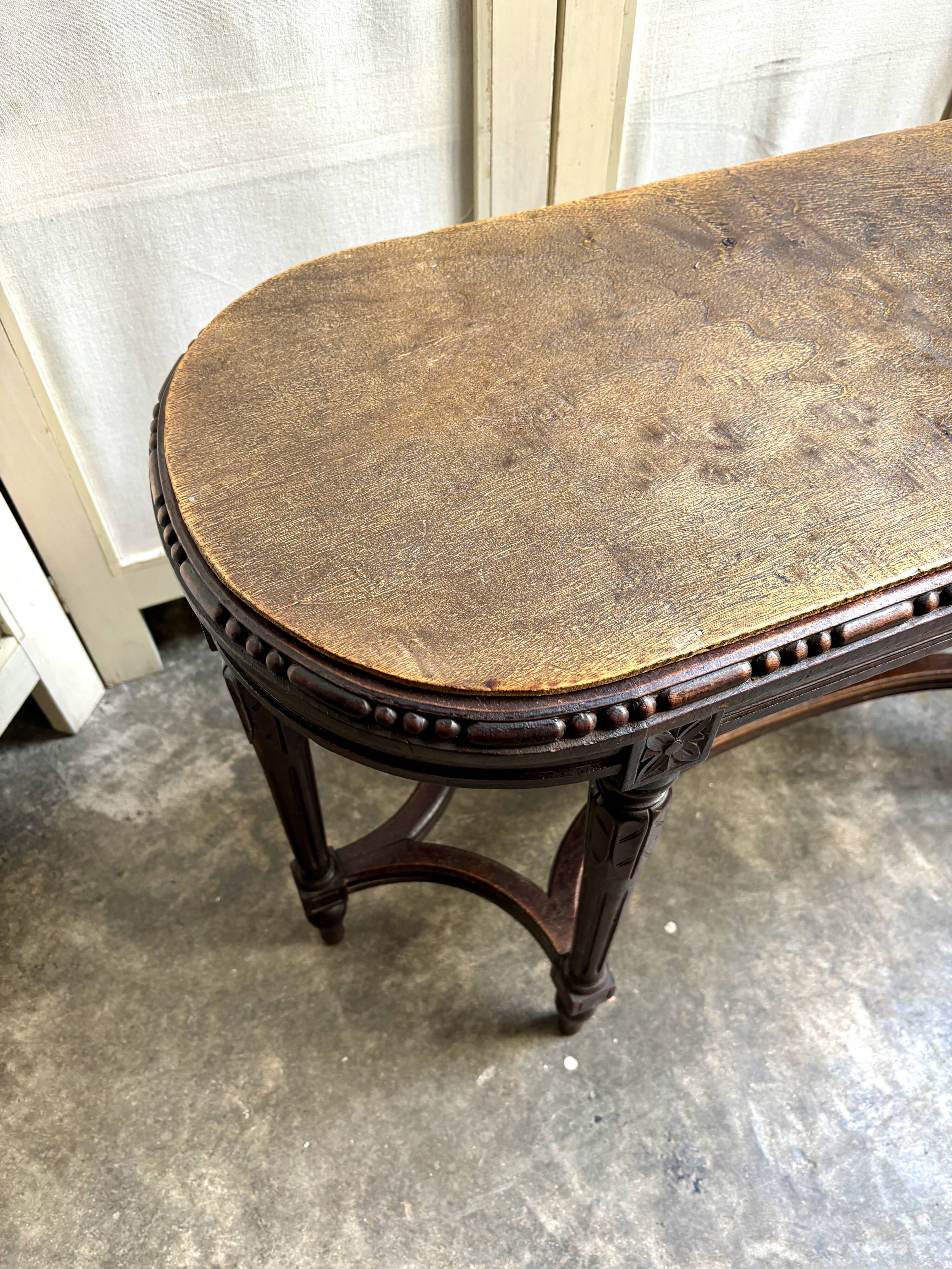 Dark wood piano bench