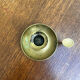 Antique push candle holder