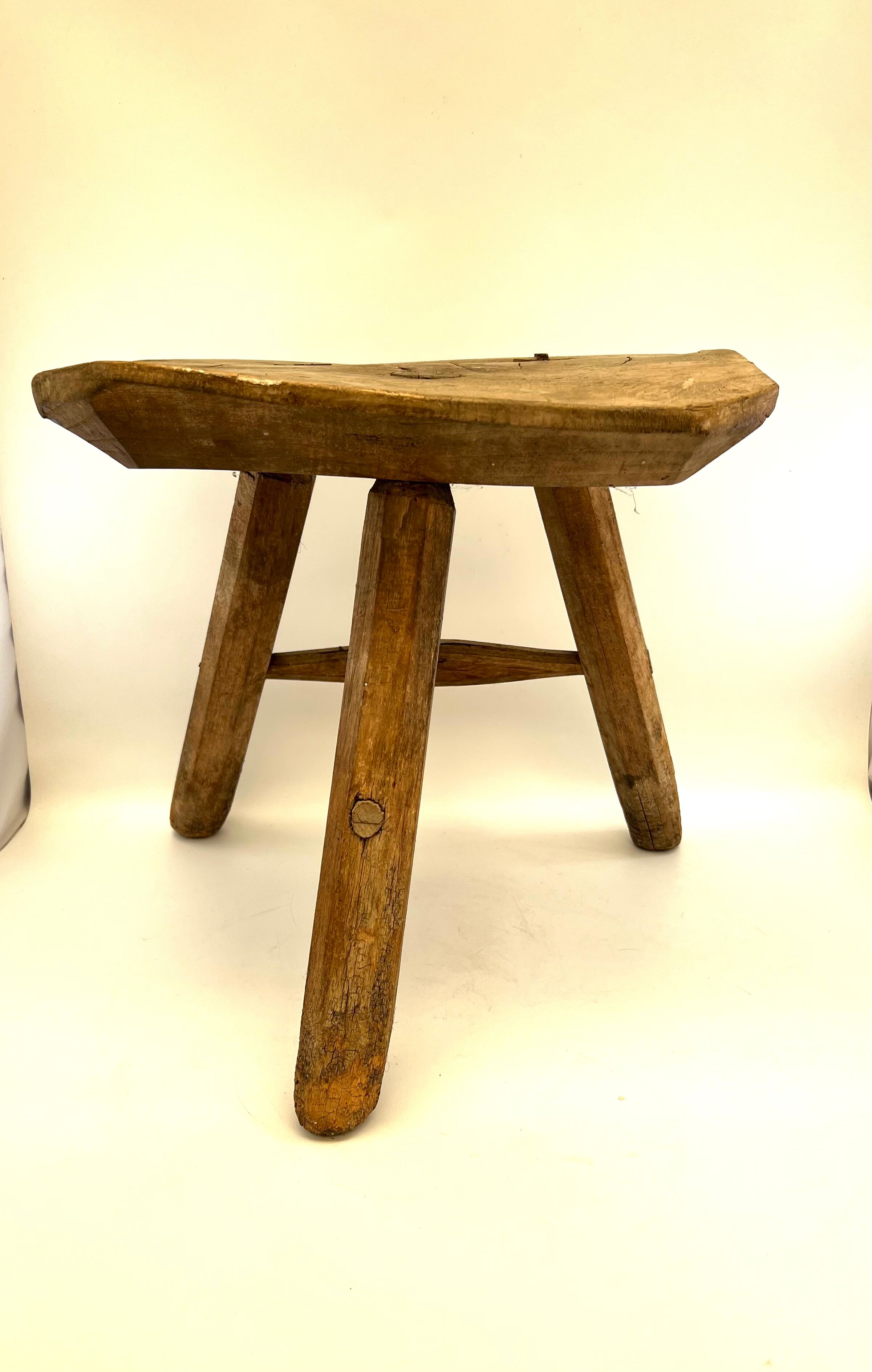 Rustic tripod wood stool