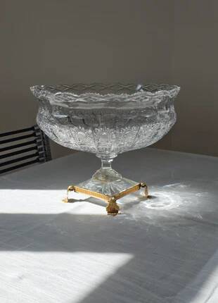 Cut crystal bowl on a brass base in bohemian style.