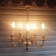 Antique gilded bronze chandelier in Louis XVI style, 5 lights, in working condition.