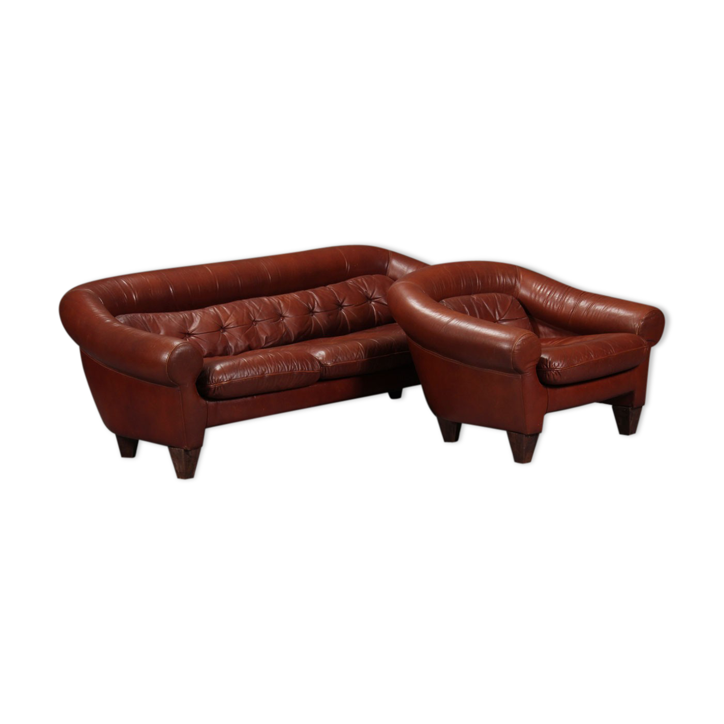 Sofa and a caramel leather armchair