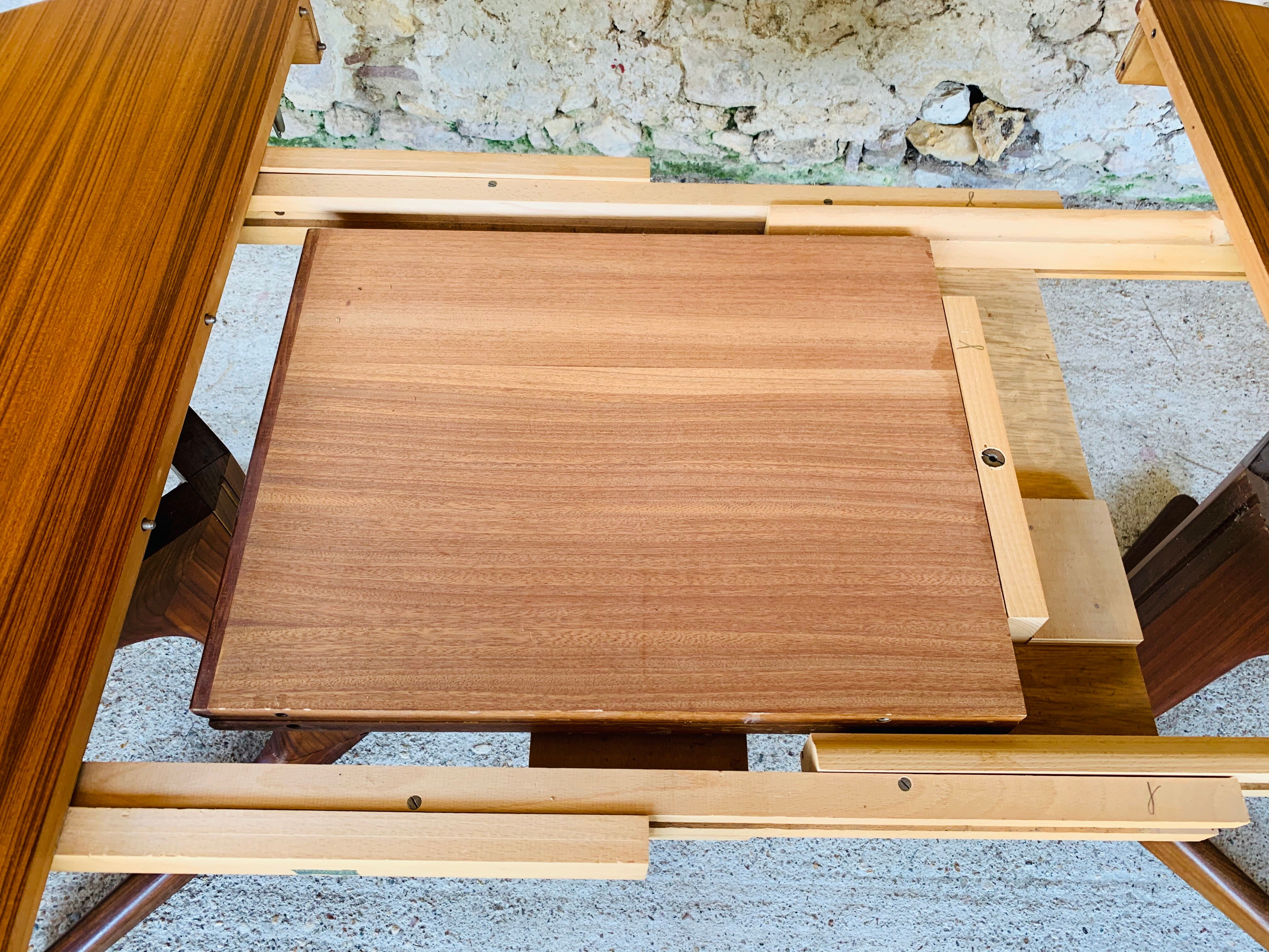 Extendable Scandinavian style dining table with double elongations by Maison Ducau, Circa 1970