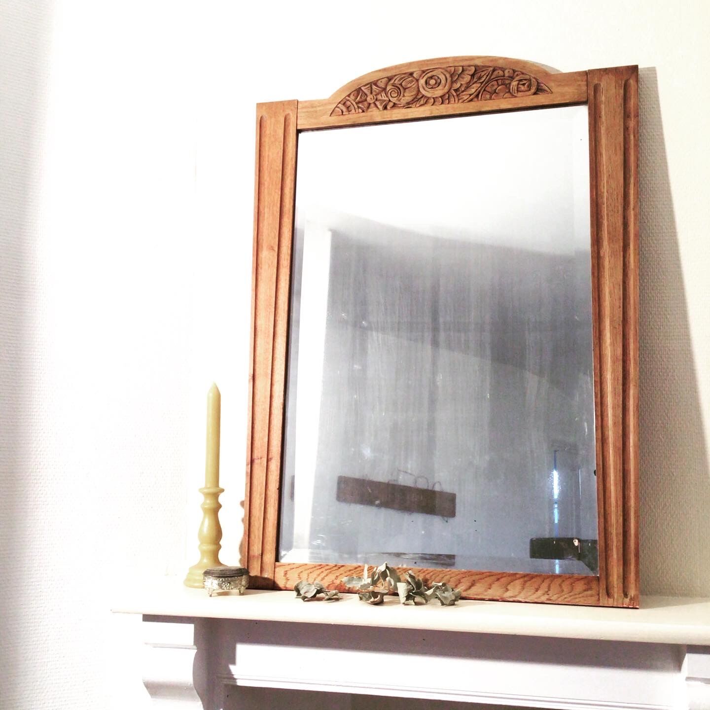 Beveled fireplace mirror