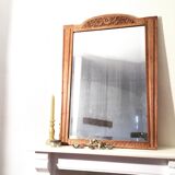 Beveled fireplace mirror
