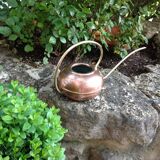 Red copper watering can in Scandinavian style 60s-70s