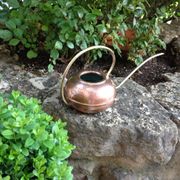 Red copper watering can in Scandinavian style 60s-70s