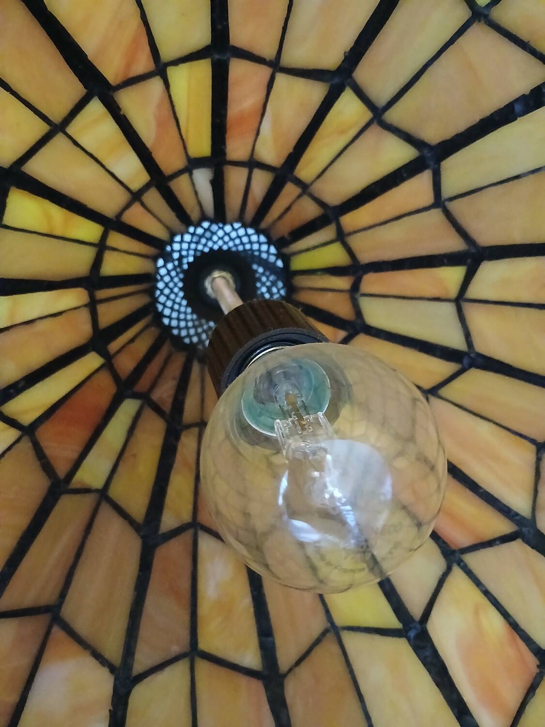 Antique stained glass and bronze pendant light