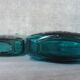 Blue engraved glass bottles