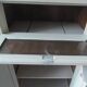 Small vintage piece of furniture sublimated in a linen shade, wooden top.