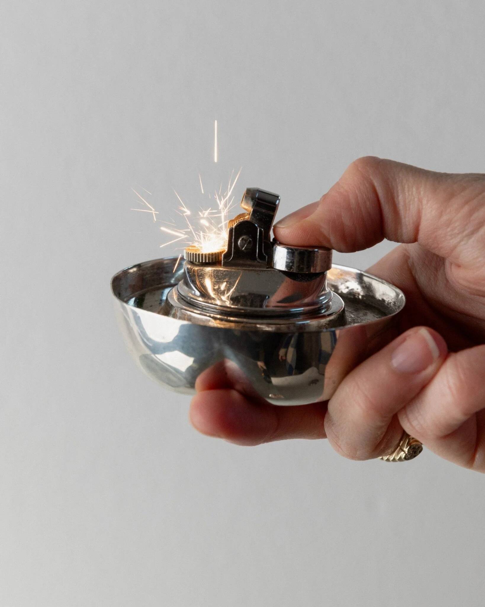 Silver-plated vintage Christian Dior Pumpkin set: two lidded metal bowls with removable integrated lighter, 1970s