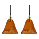 Set of two amber glass hanging lamps