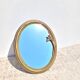 Miroir ovale en laiton doré style belle époque
