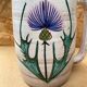 Antique vallauris ceramic pitcher with vintage blue thistle decor