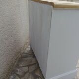 Beautifully crafted English chest of drawers, finished in pearl grey, with a wooden top.