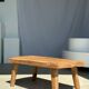 Coffee table in blond teak quadripod