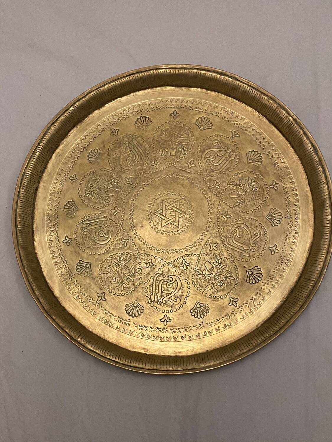 Old Moroccan tray in yellow copper