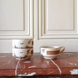 Three large stoneware cups with floral pattern, art deco